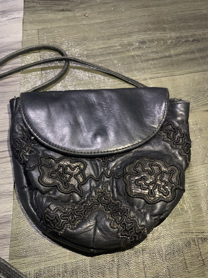 Braccialini soutache (Category: Luxury Bags & Wallets) located in Manila. Submitted by zthriftyyy (Listing ID 1470708969, Image 2). Description: Vintage Braccialini Leather Crossbody Bag | Made in Italy Authentic 90s-2000s Braccialini. Genuine leather with intricate embroidery. Statement Italian vintage piece. DETAILS: - Brand: Braccialini - Genuine Leather - Made in Italy - Color: Black with metallic embroidery - Features: Long strap with knot, 