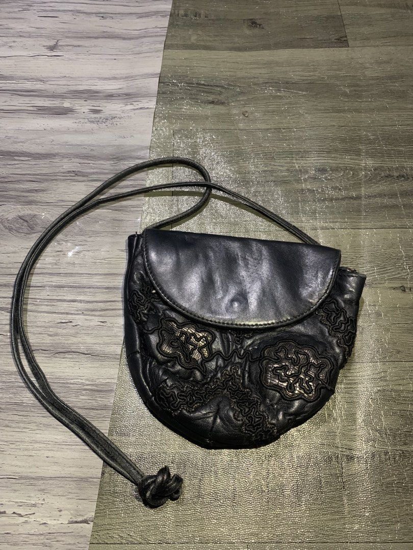 Braccialini soutache (Category: Luxury Bags & Wallets) located in Manila. Submitted by zthriftyyy (Listing ID 1470708969, Image 1). Description: Vintage Braccialini Leather Crossbody Bag | Made in Italy Authentic 90s-2000s Braccialini. Genuine leather with intricate embroidery. Statement Italian vintage piece. DETAILS: - Brand: Braccialini - Genuine Leather - Made in Italy - Color: Black with metallic embroidery - Features: Long strap with knot, 