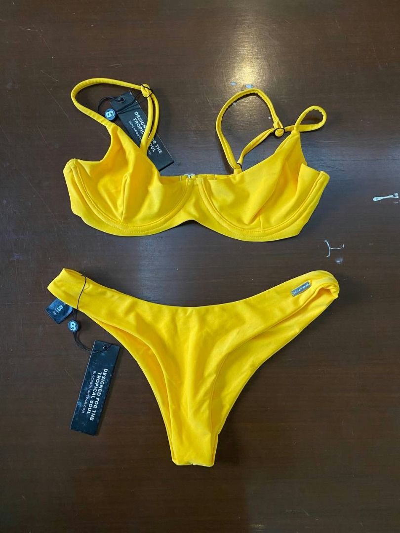 Brand New Blackbough Bikini Top & Bottom S (Category: Bikinis & Swimsuits) located in Muntinlupa City. Submitted by irene.aragon.navarro (Listing ID 1470634960, Image 1). Description: Bright yellow two-piece swimsuit. Underwire top with adjustable shoulder straps. Matching high-cut bottoms with minimal coverage. Original tags still attached to both pieces. Vibrant color, ready for the beach or pool..