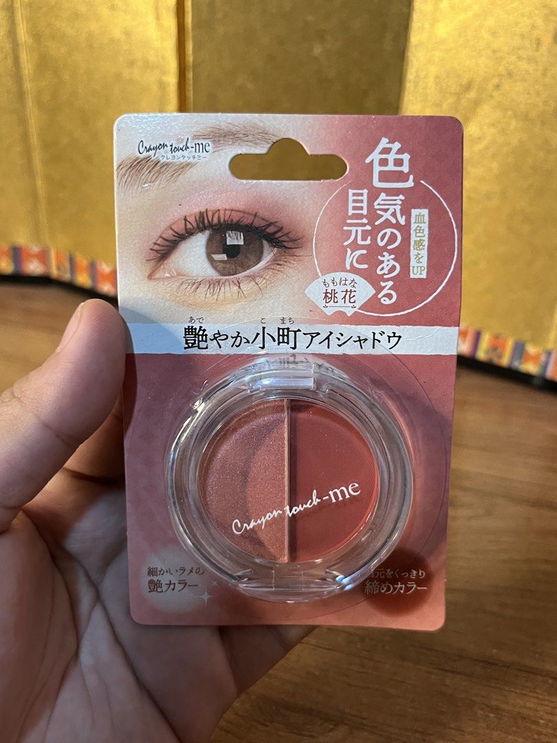 Brand New Crayon touch-me Eyeshadow (Category: Makeup) located in Gapan. Submitted by lunashop14 (Listing ID 1470636184, Image 1). Description: - Brand: Crayon touch-me - Shade: A Momo-bana (Two-tone eyeshadow palette) - Features: Shimmering light color + deeper reddish shade for contouring - Net Weight: 0.8g (Compact and travel-friendly) - Condition: Brand new, sealed in original blister packaging - Origin: Made in Taiwan.