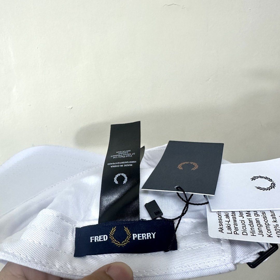 Brand new Fred Perry Cap (Category: Caps & Hats) located in Manila. Submitted by dane.closet (Listing ID 1470651345, Image 3). Description: Brand new Fred Perry Cap Size: One size fits all -Adult size Brand new never been worn No flaws at all 10/10 Color rate Authentic/Original with complete tags Price: 1650 ✔️ COD via Lalamove ✔️ Door to door delivery through J&T express ✔️ Open for meetups within Makati Dm me 💯.