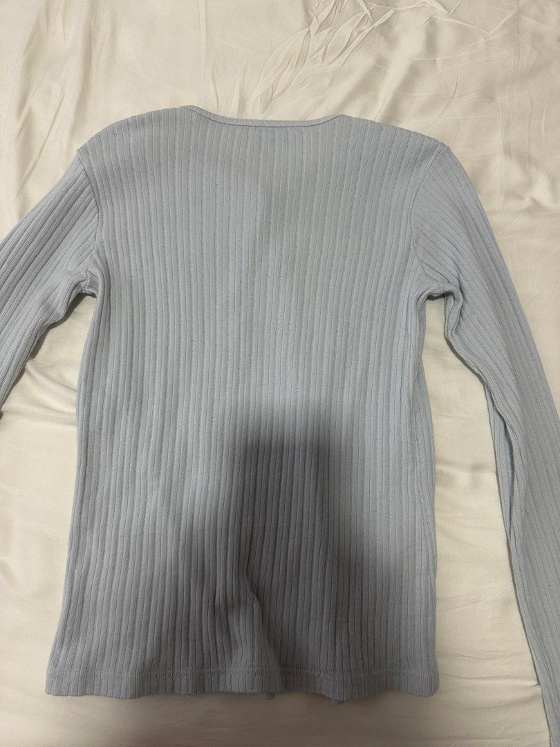 Brandy Melville Light Blue Ribbed Cardigan (Category: Coats, Jackets and Outerwear) located in Taguig. Submitted by aandco. (Listing ID 1470693796, Image 2). Description: - Brand new without tags - Bought from Brandy Shanghai - last price, already selling for lower - BGC area.