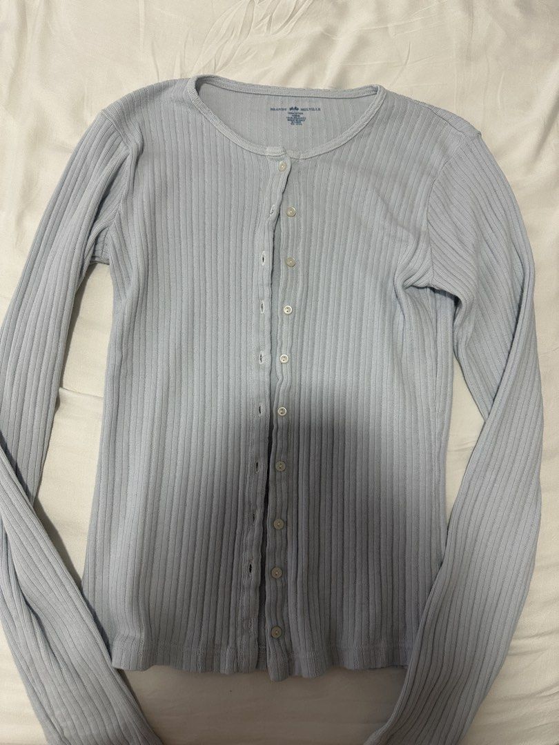 Brandy Melville Light Blue Ribbed Cardigan (Category: Coats, Jackets and Outerwear) located in Taguig. Submitted by aandco. (Listing ID 1470693796, Image 1). Description: - Brand new without tags - Bought from Brandy Shanghai - last price, already selling for lower - BGC area.