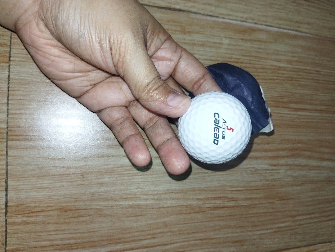 Bridgestone Altus New Golf Balls 2 Pack (Category: Golf) located in Pasig City. Submitted by cityshopperph (Listing ID 1470598035, Image 2). Description: - Authentic Bridgestone Altus golf balls (set of 2) - Brand new and unused condition - Comes in original clear plastic display box - Each ball individually wrapped in dark tissue paper - Classic white design with red and blue lettering - Great for gifting, display, or a round on the course.