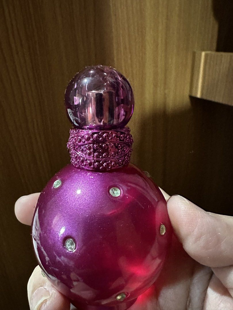 Britney Spears Fantasy Eau De Parfum 30ml (Category: Fragrance & Deodorants) located in Balanga. Submitted by jamilbeauty5 (Listing ID 1470564054, Image 1). Description: - Item: Britney Spears Fantasy Eau de Parfum - Size: 30ml spray bottle - Packaging: Iconic pink round bottle with rhinestone studs and original box - Origin: Made in Spain (with clear batch code and barcode) - Scent Profile: Sweet and fruity, perfect for everyday wear - Condition
