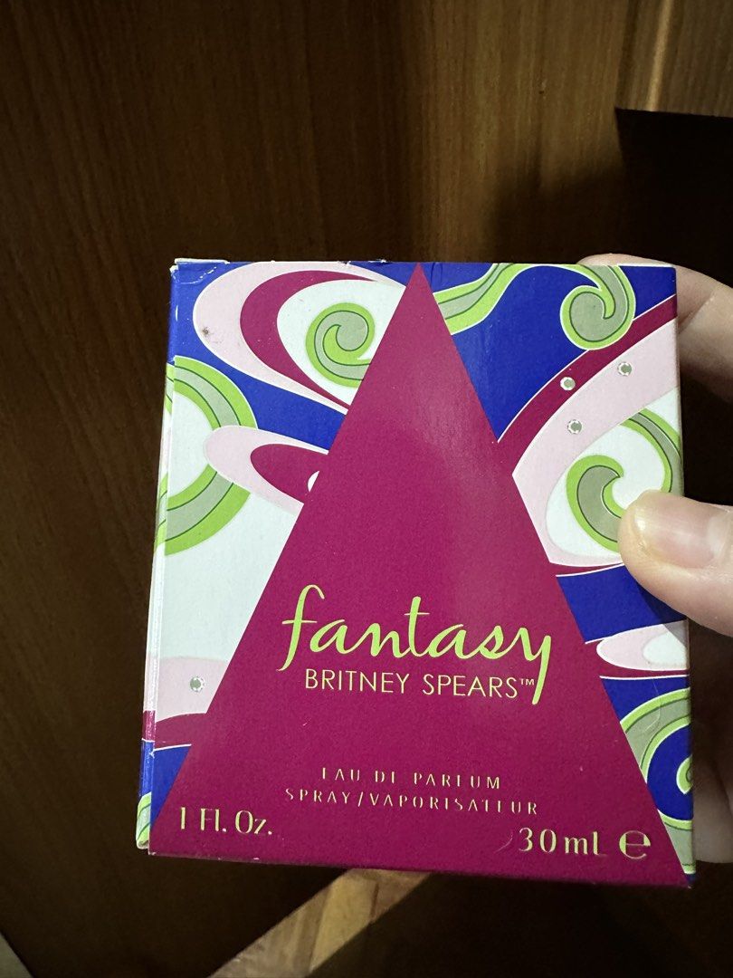 Britney Spears Fantasy Eau De Parfum 30ml (Category: Fragrance & Deodorants) located in Balanga. Submitted by jamilbeauty5 (Listing ID 1470564054, Image 2). Description: - Item: Britney Spears Fantasy Eau de Parfum - Size: 30ml spray bottle - Packaging: Iconic pink round bottle with rhinestone studs and original box - Origin: Made in Spain (with clear batch code and barcode) - Scent Profile: Sweet and fruity, perfect for everyday wear - Condition