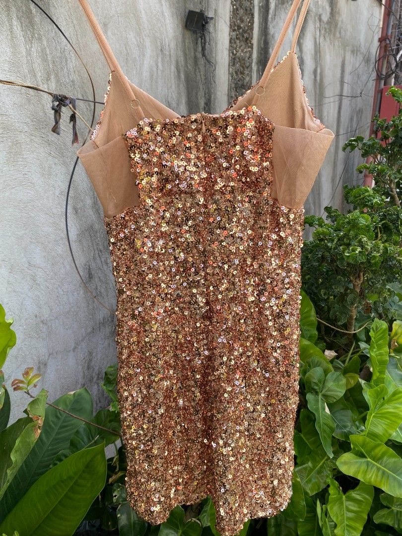 Bronze sequin mini dress (Category: Dresses) located in Argao. Submitted by royalowl-888 (Listing ID 1470598352, Image 2). Description: bronze sequin mini dress size s width 13 safe to stretch to 15 length 24 excellent condition location visayas.