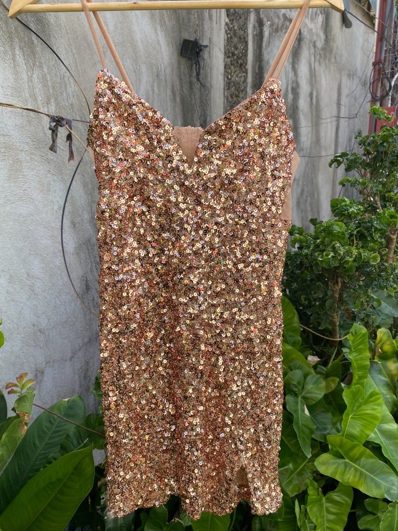 Bronze sequin mini dress (Category: Dresses) located in Argao. Submitted by royalowl-888 (Listing ID 1470598352, Image 1). Description: bronze sequin mini dress size s width 13 safe to stretch to 15 length 24 excellent condition location visayas.