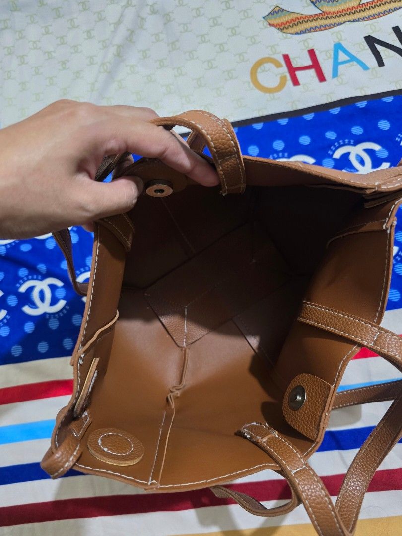 Brown Bag (Category: Shoulder Bags) located in Abucay. Submitted by solaranestbymm (Listing ID 1470606616, Image 2). Description: ITEMS ARE PRELOVED no when worn no rush shipping & requesting of courier shipping fee to be shoulders by buyer rfs: decluttering meetup- tarlac city delivery - j&t.