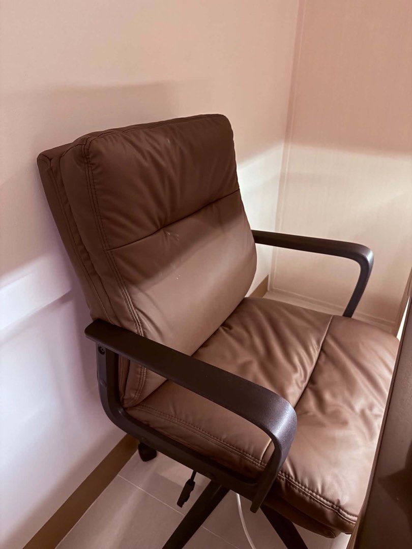 Brown Leather Office Chair (Category: Chairs) located in Manila. Submitted by j_chris (Listing ID 1470663729, Image 1). Description: Bought from OurHomes SM - Brown leather office chair with plush cushioning for all-day comfort - Adjustable height lever for custom seating - Sturdy frame with smooth-rolling wheels for easy mobility - Features dark armrests and a clean surface - Perfect for home offices and daily work setups RFS: Need a smaller cha