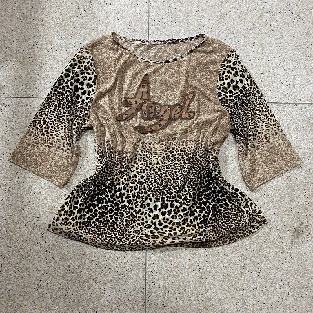 Brown Mesh Leopard Top - Studded Angel Graphic (Category: Others Tops) located in Isabela. Submitted by islandsrelics (Listing ID 1470647577, Image 1). Description: .
