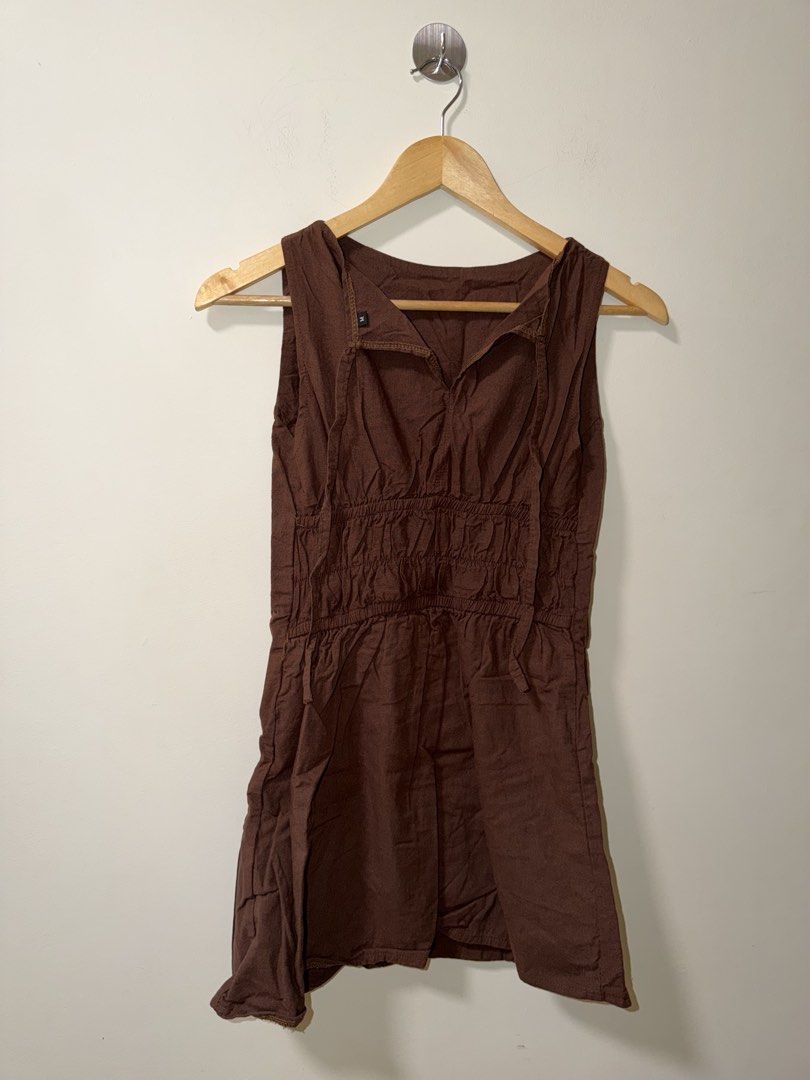 Brown Sleeveless Smocked back dress (Category: Dresses) located in Makati City. Submitted by andzr. (Listing ID 1470648479, Image 2). Description: - Color: Brown - Size: M - Details: Smocked back and adjustable tie strings.