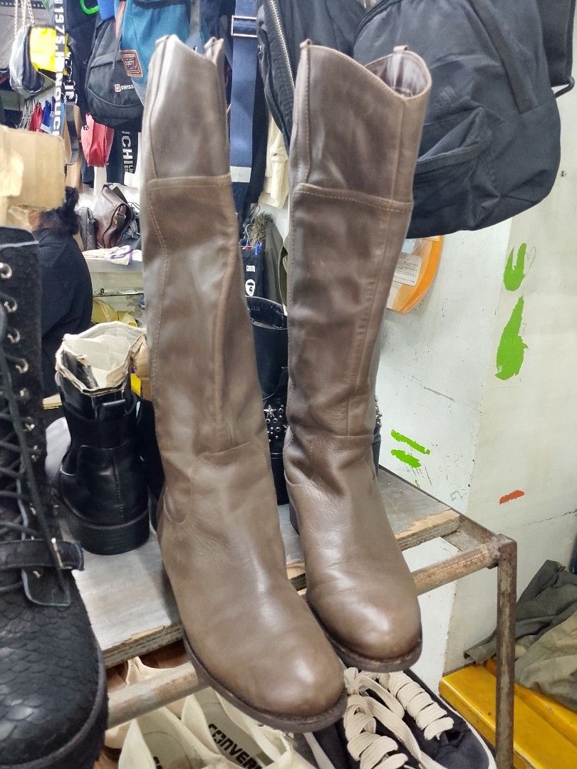 Brown Tall Leather Boots (read bio💙) look image for the size dets (Category: Boots) located in Caloocan City. Submitted by mayn_della (Listing ID 1470668091, Image 2). Description: - Style: Classic equestrian knee-high boots - Color: Versatile brown neutral - Heel: Comfortable low heel - Design: Structured side panels with clean stitching - Fit: Easy slip-on style - Pairing: Great with skirts or skinny jeans.
