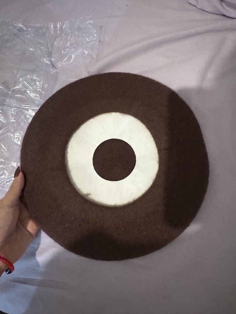 Brown woolen beret winter hat (Category: Hats & Beanies) located in Manila. Submitted by naomis_room (Listing ID 1470680523, Image 2). Description: - Color: Solid brown - Material: Soft wool texture - Design: Classic round shape with traditional top stem - Condition: Excellent, comes with original inner paper insert to maintain shape - Style: Great cooler weather accessory, easy to pair with coats and sweaters.