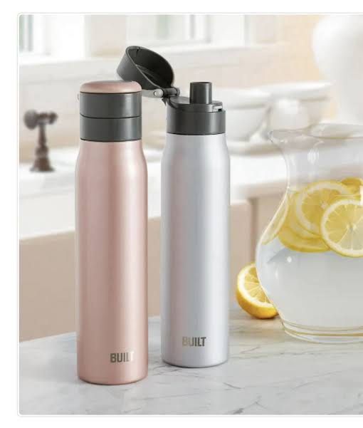 Built Stainless Steel Water Bottle Silver Grey (Category: Water Bottles & Tumblers) located in Manila. Submitted by momfinds.mnl (Listing ID 1470618895, Image 1). Description: - Brand: Built - Color/Material: Silver grey stainless steel - Lid: Push-button mechanism with a lock switch to prevent accidental spills - Design: Wide mouth opening for easy cleaning and adding ice cubes - Performance: Keeps drinks hot or cold throughout the day - Conditi
