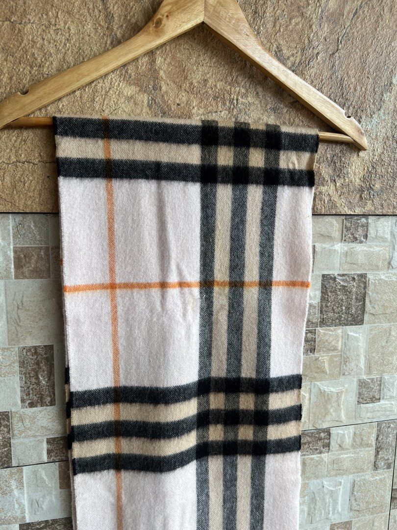 BURBERRY - PLAID DESIGN CASHMERE SCARF (Category: Scarves) located in Bacolod City. Submitted by timelessbyjosh (Listing ID 1470694109, Image 2). Description: BEST FOR COZY OUTFITS SIZE : ACTUAL COLOR : BLACK , BEIGE , BROWN & ORANGE COLOR RATE : 10 OUT OF 10 CONDITION : EXCELLENT MATERIAL : 100 % CASHMERE MADE IN : SCOTLAND FLAWS : NONE DIMENSIONS LENGTH - 65 WIDTH - 11. 5 MEASUREMENT TAKEN WHILE LAYING FLAT..