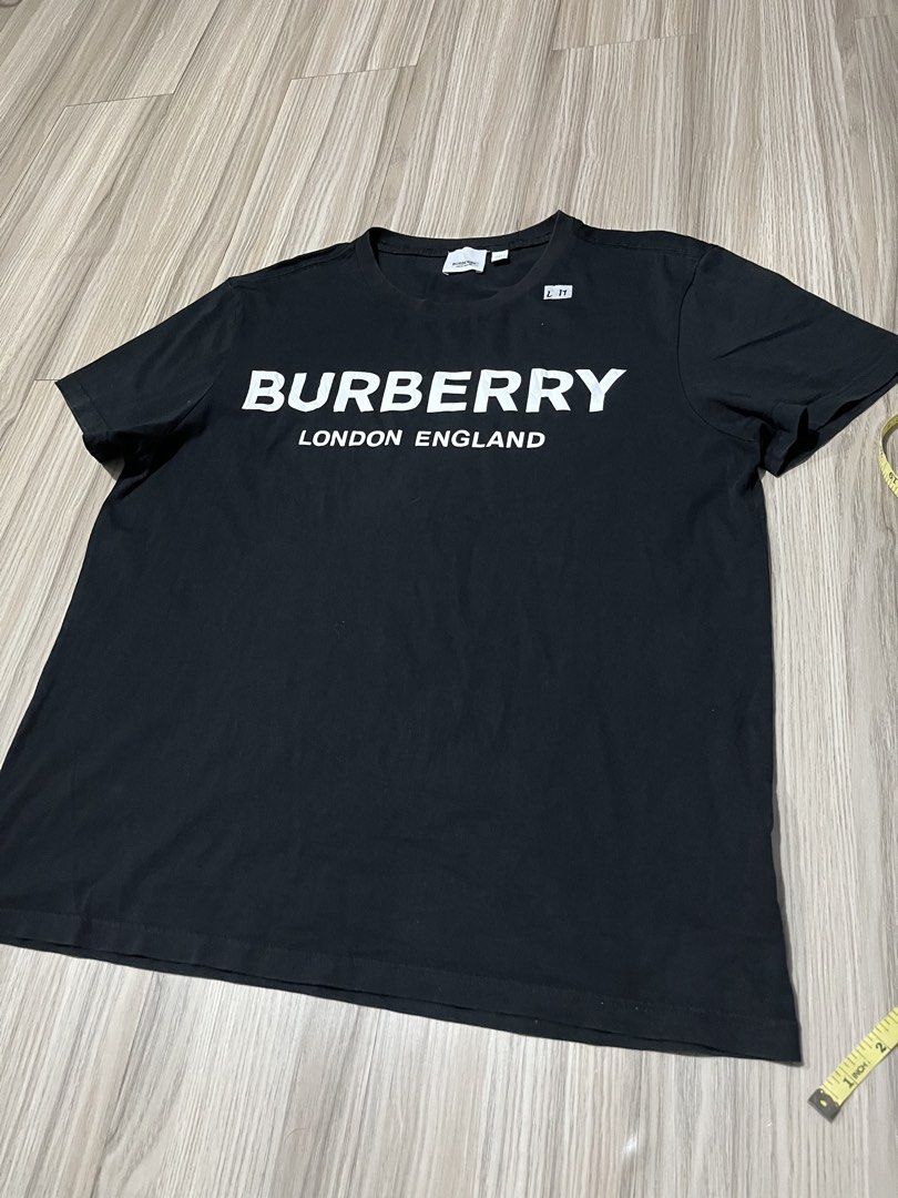 Burberry black tshirt (Category: Tshirts & Polo Shirts ) located in Lipa City. Submitted by hoywilliam (Listing ID 1470717161, Image 2). Description: Burberry black tshirt(Medium to large) off only/fake Width-21.5 Length-26.7 9/10 color condition For only 450 free shipped Location-Lipa City Batangas📍 .