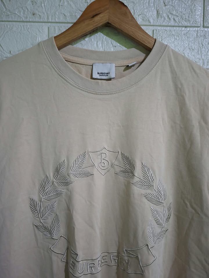 BURBERRY FULLY EMBROID LOGO SHIRT (Category: Shirts) located in Bulacan. Submitted by bleue.finds (Listing ID 1470660507, Image 2). Description: BURBERRY FULLY EMBROID LOGO SHIRT 22.5 - width 29 - length as new no issue good condition .