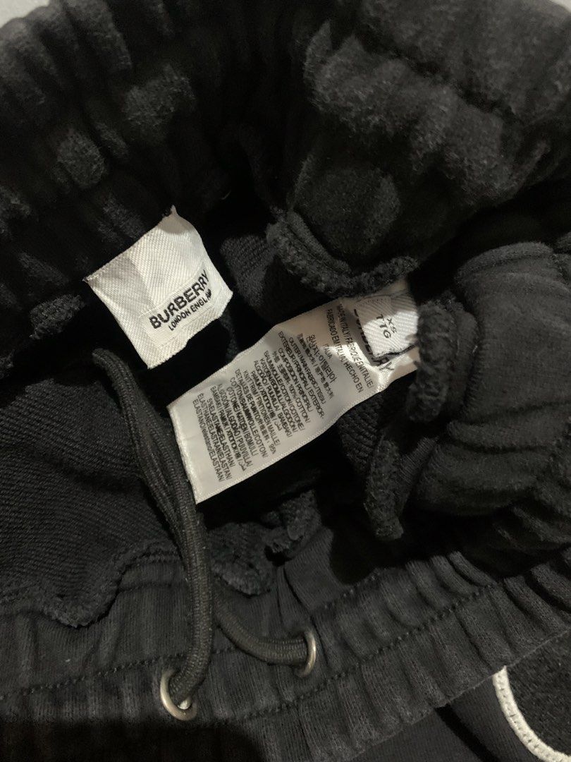 Burberry Ghost Applique Black Sweat Shorts (Category: Luxury Apparel) located in General Santos City (Dadiangas). Submitted by stockyards (Listing ID 1470591043, Image 3). Description: - Brand: Burberry - Color: Black - Size: XS - Material: 100% cotton with knit trim blend (Made in Italy) - Features: Drawstring elastic waist, practical side pockets, and a back pocket with tonal Burberry lettering - Detail: Unique embroidered ghost graphic on the 