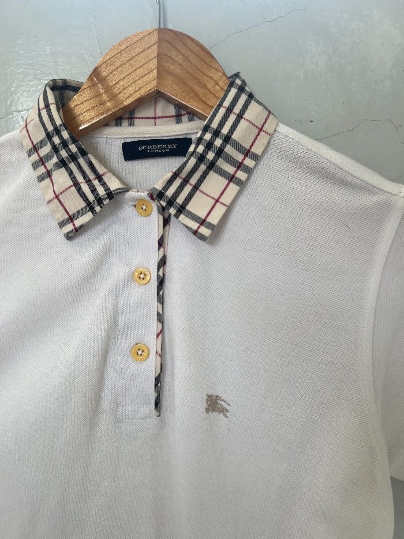 Burberry Plaid Collar Polo (Category: Others Tops) located in Baguio. Submitted by thrifty1.6 (Listing ID 1470635980, Image 2). Description: Burberry SMALL Excellent Condition BAGUIO LOCATION.