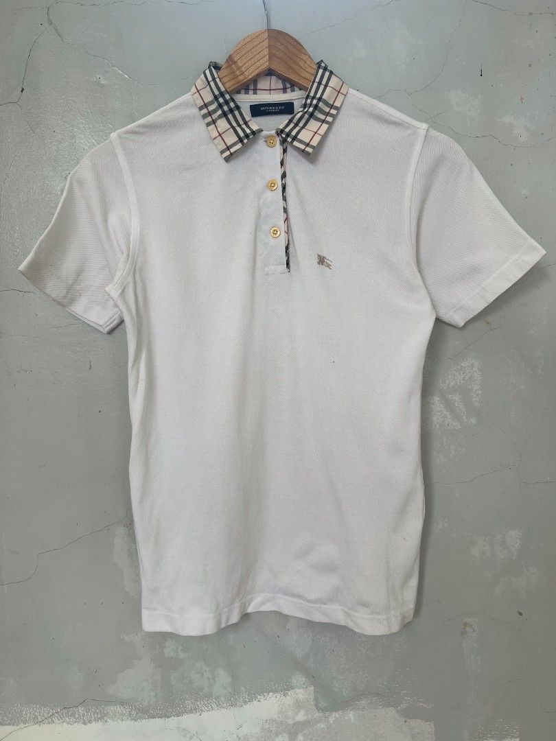 Burberry Plaid Collar Polo (Category: Others Tops) located in Baguio. Submitted by thrifty1.6 (Listing ID 1470635980, Image 1). Description: Burberry SMALL Excellent Condition BAGUIO LOCATION.