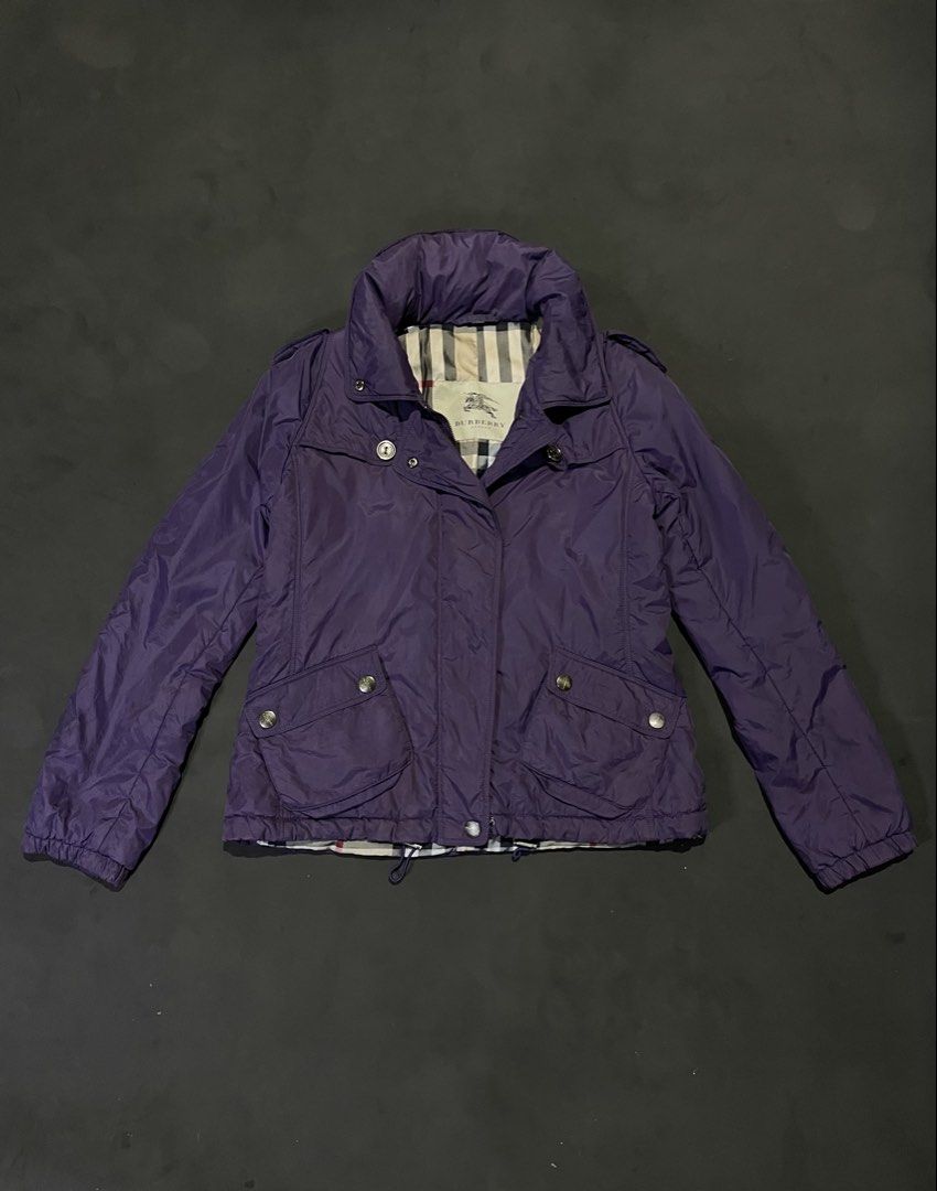 BURBERRY PURPLE NYLON DOWN PUFFER JACKET WITH HOOD (Category: Luxury Apparel) located in Bocaue. Submitted by mosthighcollective (Listing ID 1470711925, Image 1). Description: BURBERRY PURPLE NYLON DOWN PUFFER JACKET WITH HOOD Size: L on tag Dimes: 20 width 24 length Excellent condition No issue 3,500 only Dm me to purchase 📥.