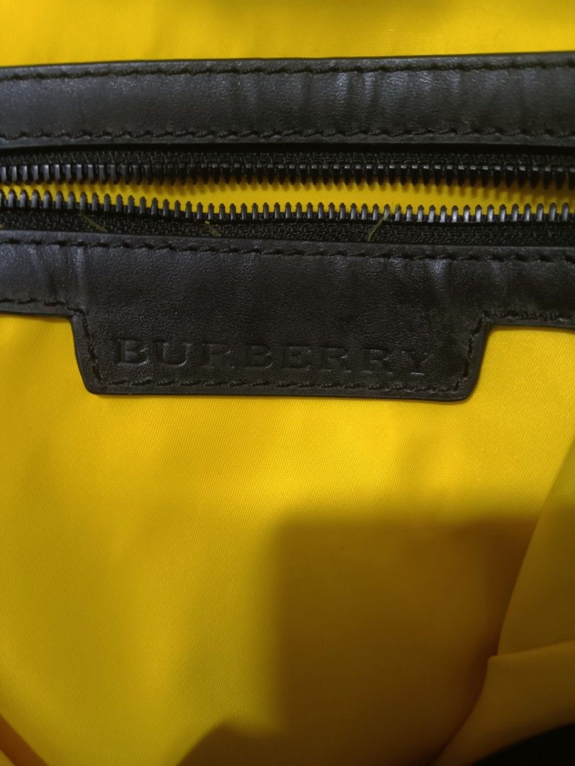 Burberry tote bag (Category: Luxury Bags & Wallets) located in Muntinlupa City. Submitted by kamiseta01 (Listing ID 1470636563, Image 3). Description: authentic Burberry tote bag nylon material details posted leather handle.