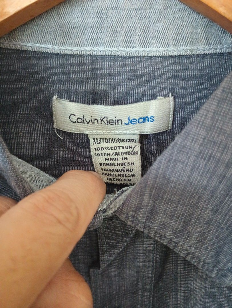 Calvin Klein Jeans (Category: Formal Shirts) located in Las Pinas. Submitted by preloved_manila (Listing ID 1470578449, Image 3). Description: Teens size XL Adult size SMALL Width: 20 Length: 26 Shoulders: 17 Sleeves: 21.5.