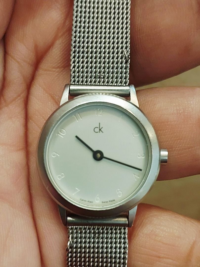 Calvin Klein K03131 Mesh Strap Watch (Category: Women's Watches) located in Batangas. Submitted by vintageanddainty (Listing ID 1470590331, Image 2). Description: - Brand: Calvin Klein - Model: K03131 (engraved on case back) - Movement: Swiss Made - Dial: Round white dial with black hands and numeric hour markers - Strap: Silver stainless steel mesh with secure clasp closure - Water Resistance: Up to 30M - Style: Clean minimalist design, standard