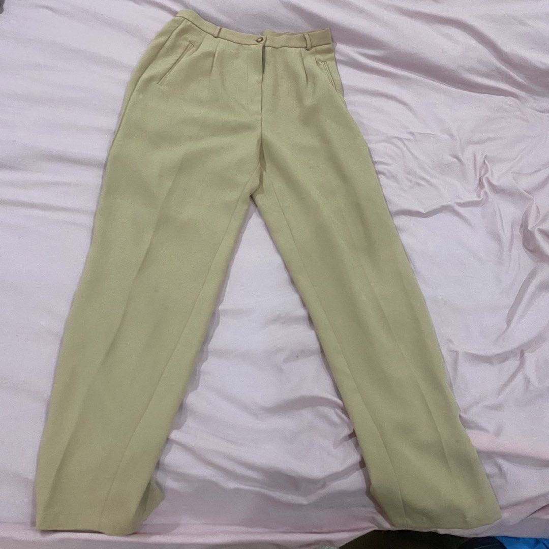 Calypso High-Waisted Pleated Trousers (Category: Trousers) located in Pasay City. Submitted by thrift_from_me (Listing ID 1470557826, Image 2). Description: - Color: Versatile beige - Fits 26-28 waist for 5’2-5’5 height - Fit: High waist with straight leg cut - Details: Front pleats, belt loops, and functional side pockets - Closure: Front button and zip closure - Authenticity: Inner label clearly shows the brand logo - Finish: Clean fabric finis