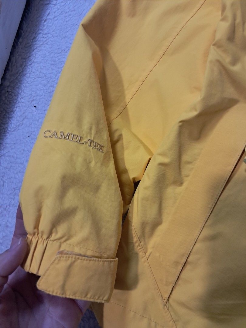 Camel outdoor rain jacket (Category: Coats, Jackets and Outerwear) located in Baguio. Submitted by mishmashfritz (Listing ID 1470666529, Image 3). Description: excellent used condition, thrifted, needs wash, light stain sa sleeves, waterproof, breathable jacket, adjustable hood.
