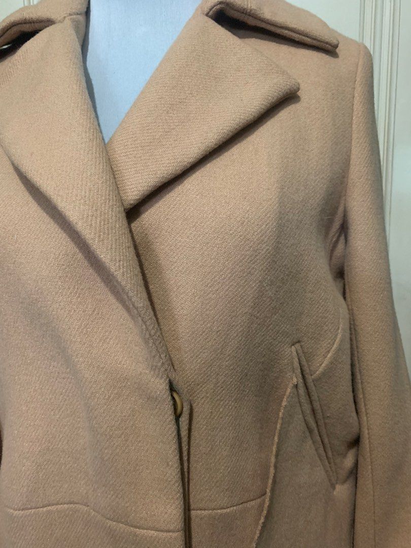 Camel Trench Coat Wool Blend Winter Jacket (Category: Coats, Jackets and Outerwear) located in Quezon City. Submitted by clothingline4sale (Listing ID 1470611275, Image 3). Description: Tan Wool Winter Coat Very good condition/ like new Has lining / Good quality / Size: medium - large Bust: up to 44” ; Length: 33” ; Arms Circumference: 16”; Shoulder to shoulder: 17” Very nice in actual .