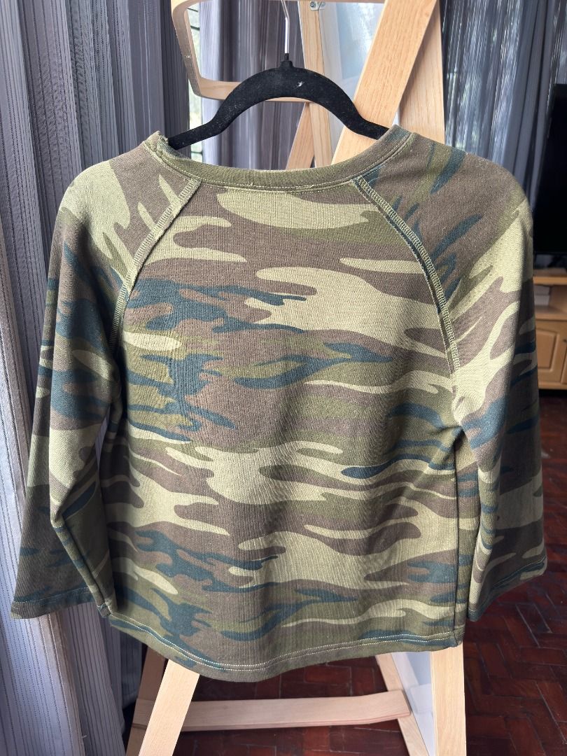 Camo pattern longsleeve sweatshirt S (Category: Coats, Jackets and Outerwear) located in Cebu City. Submitted by _t.rix (Listing ID 1470570740, Image 2). Description: - Green camouflage print sweater - Ribbed knit material - Raglan sleeves and round neckline - Standard fit for everyday casual wear - Easy to pair with jeans or joggers.
