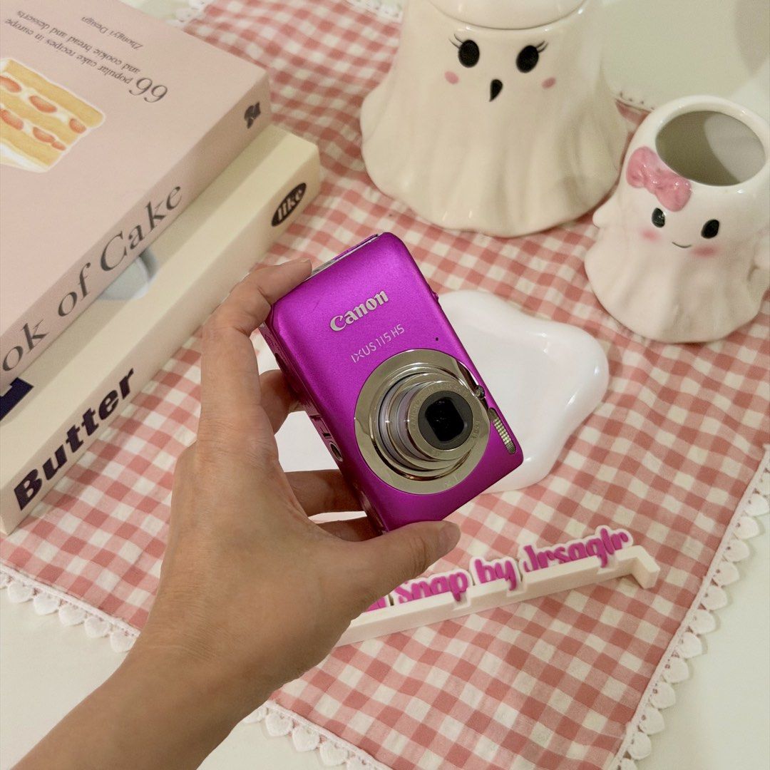 Canon IXUS 115 HS Pink Digital Camera (Category: Cameras) located in Manila. Submitted by decluttered_by.kisses (Listing ID 1470609425, Image 3). Description: Model: Canon Ixus 115 HS / elph 100 / Ixy 210F ♡₊˚ - crisp outputs! - with movie digest! price: [🔖 ₱6,499 + SF] ╰┈➤ comment “mine” 🛒 IG: @blissful.snap FB Page: Blissful Snap Tiktok: @blissful.snap 🌸 𝗱𝗲𝘁𝗮𝗶𝗹𝘀: 📸 – Key Features • 12.1 MP CMOS sensor • 4× Optical Zoom (28mm wide) • 