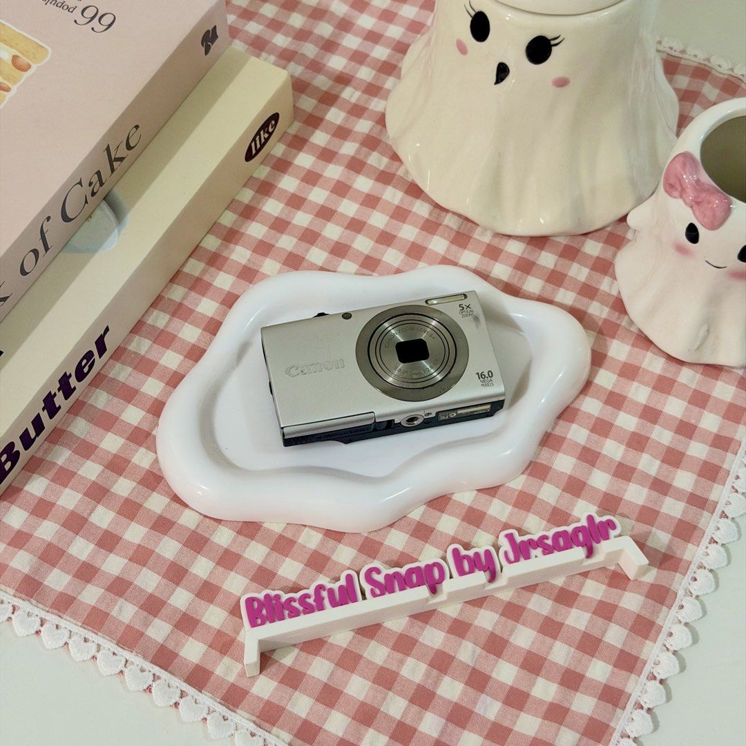 Canon PowerShot A2300 HD Digital Camera (Category: Cameras) located in Manila. Submitted by decluttered_by.kisses (Listing ID 1470583946, Image 2). Description: Model: Can♡n Powershot a2300 ♡₊˚ price: [🔖 ₱7,200 + SF ] ╰┈➤ comment “mine” 🛒 IG: @blissful.snap FB Page: Blissful Snap Tiktok: Blissful.snap 🌸 𝗱𝗲𝘁𝗮𝗶𝗹𝘀: 📸 – Key Features • 16 MP CCD sensor • 5× optical zoom (28–140 mm equivalent) • DIGIC 4 image processor • 2.7″ / 230k-dot LCD 