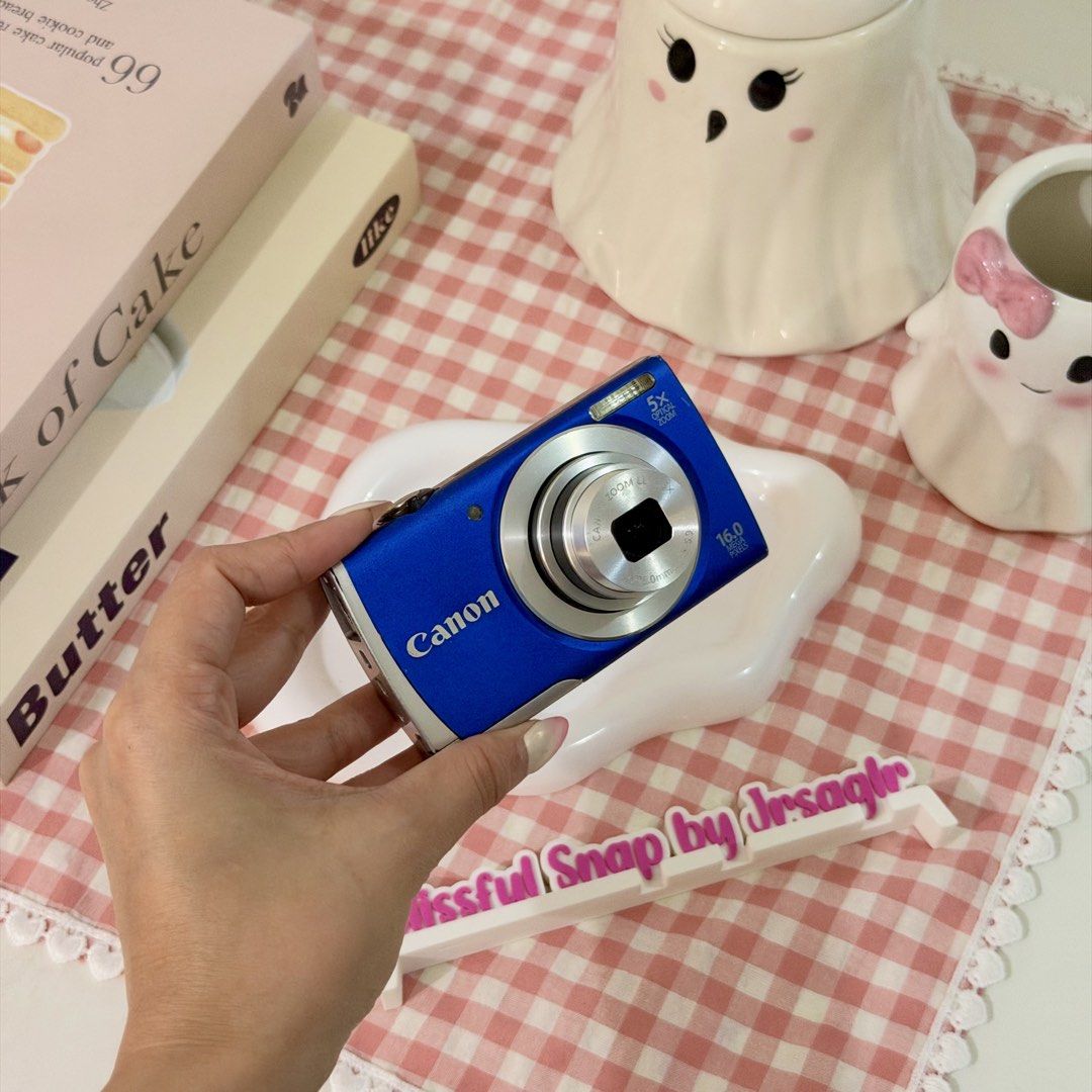 canon powershot a2600 (Category: Cameras) located in Manila. Submitted by decluttered_by.kisses (Listing ID 1470583747, Image 3). Description: Model: Can♡n Powershot A2600 ♡₊˚ price: [🔖 ₱6,699 + SF] ╰┈➤ comment “mine” 🛒 IG: @blissful.snap FB Page: Blissful Snap Tiktok: blissful.snap 🌸 𝗱𝗲𝘁𝗮𝗶𝗹𝘀: 📸 – Key Features • 16.0 Megapixels • 5x Optical Zoom (28–140mm equivalent) • 3.0-inch LCD Display • DIGIC 4 Image Processor • 720p HD Video Reco