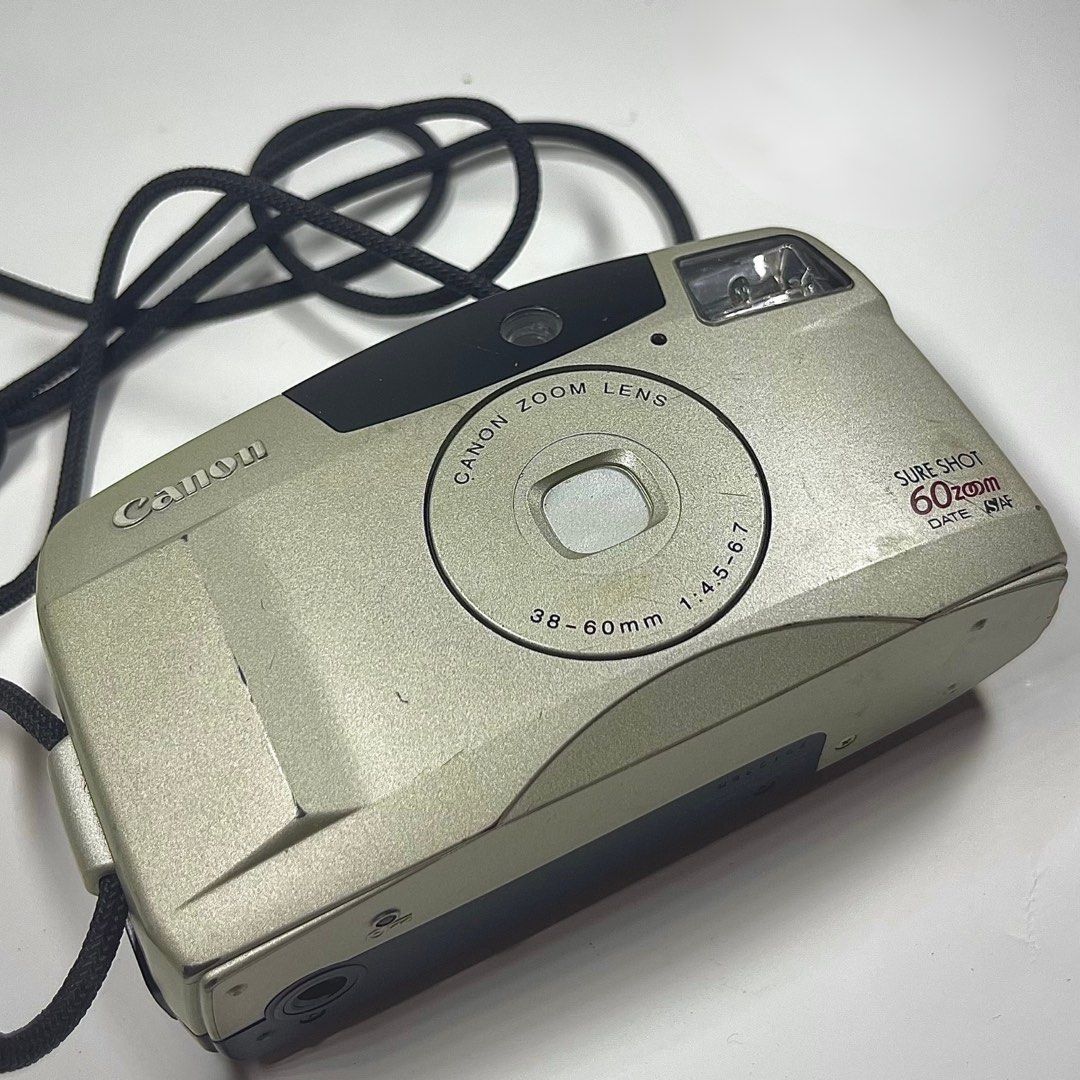Canon Sureshot 60zoom (Category: Cameras) located in Cavite. Submitted by gwythrifts (Listing ID 1470697928, Image 3). Description: Canon Sureshot 60zoom AS IS Condition: 8/10 Issue: clicking issue Inclusions: Strap ₱ 2000.