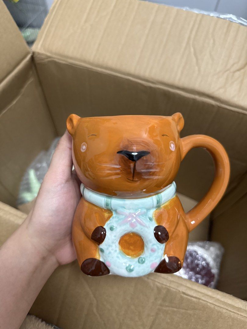 Cappybara Xmas cutie mug (Category: Coffee & Tea Tableware) located in Quezon City. Submitted by fragilebabies (Listing ID 1470563022, Image 1). Description: Please be reminded that these mugs are mall pull-out items. Minor imperfections such as small chips, slight paint chips, crazing (fine hairlines), and other minor marks may be present and are considered normal for mall pull-out items. That said, most of our mugs are still in good condition. 
