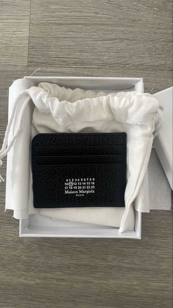 Card holder wallet - Maison Margiela (Category: Luxury Bags & Wallets) located in Manila. Submitted by vito.ortizz (Listing ID 1470593818, Image 1). Description: Brand new with box and dust bag Premium quality Multiple card slots Dm for more details.