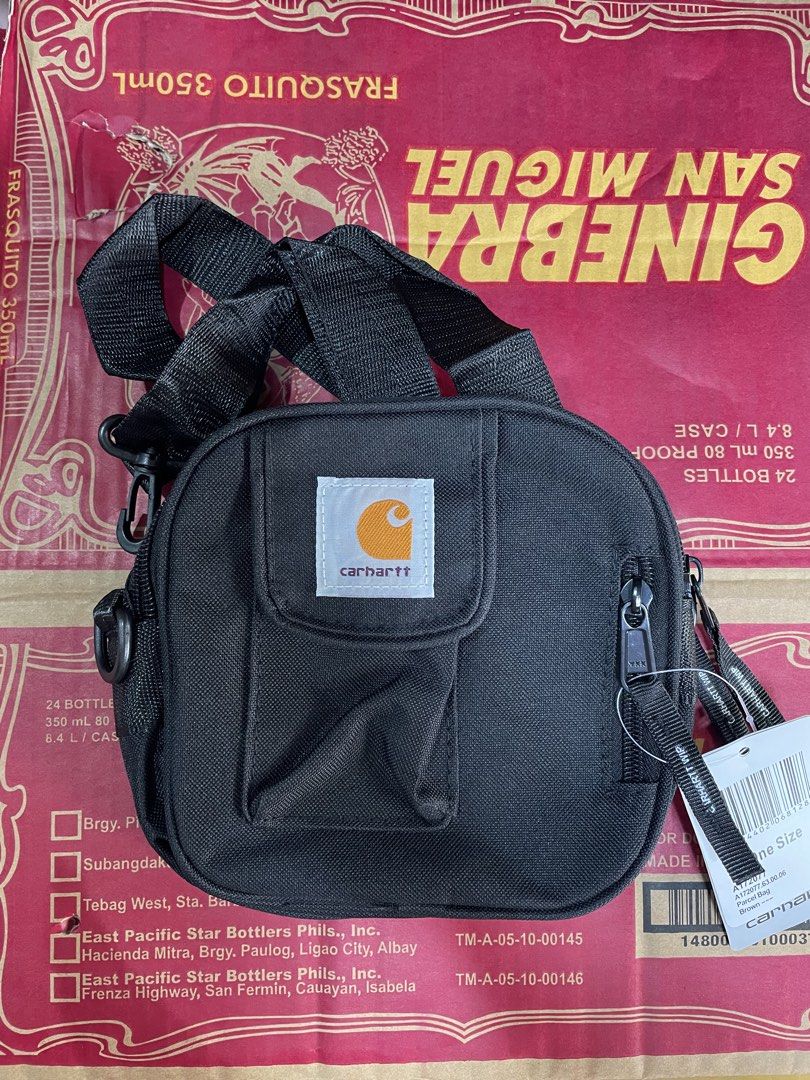 Carharrt WIP Black Parcel Crossbody Bag (Category: Sling Bags) located in Baguio. Submitted by elayor3 (Listing ID 1470701099, Image 1). Description: - Brand: Carhartt WIP - Color: Black - Condition: Brand new with tags - Material: Durable heavy-duty canvas - Hardware: YKK zippers with branded pull tabs - Compartments: Multiple zipped pockets and front flap pocket with iconic logo patch - Versatility: Adjustable strap for shoulder or crossbody we