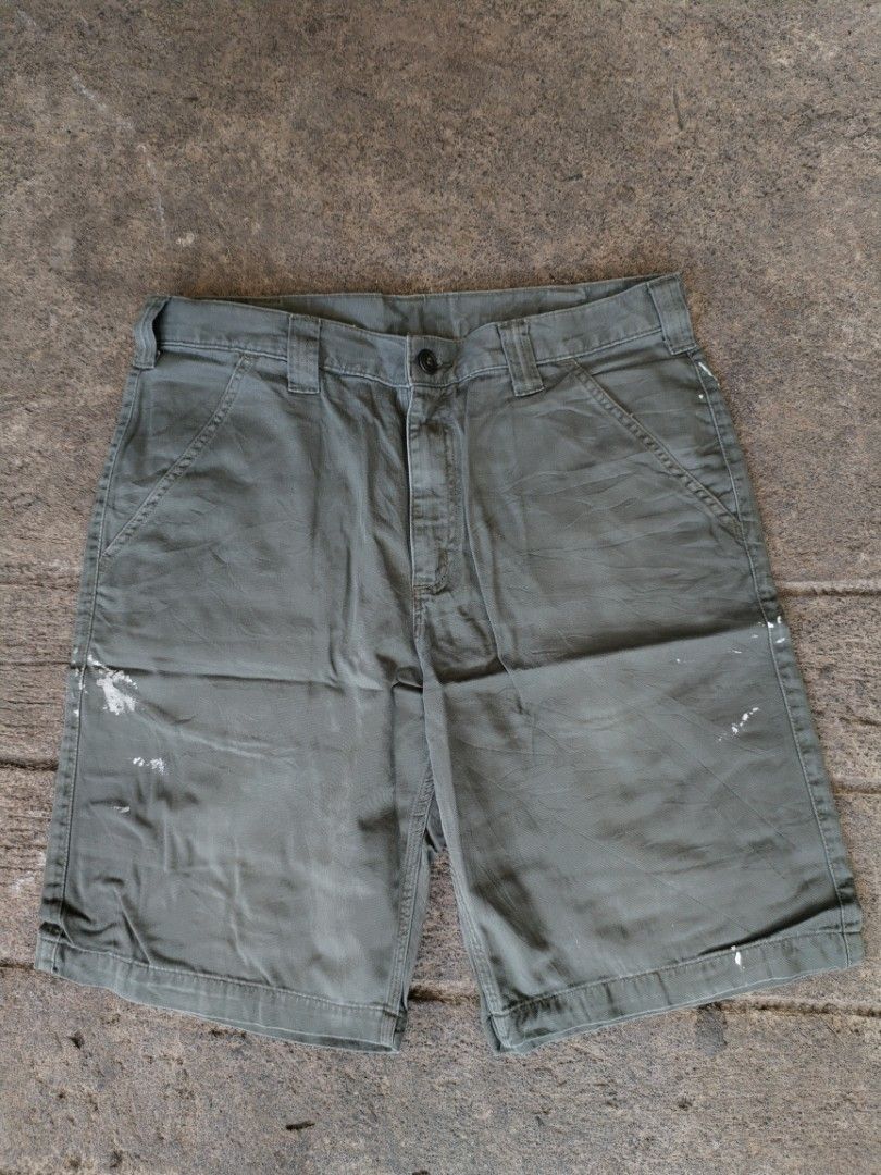 Carhartt Moss Green Work Shorts Size 34 (Category: Shorts) located in Legazpi City. Submitted by justinbarcelon (Listing ID 1470683745, Image 1). Description: - Brand: Carhartt - Item: Utility Shorts - Color: Moss Green - Size: Tagged 34 - Material: 100% cotton canvas - Closure: Button waist with zip fly - Features: Belt loops, back welt pockets with button closures and logo patch - Condition: Authentic workwear character with paint splatters and