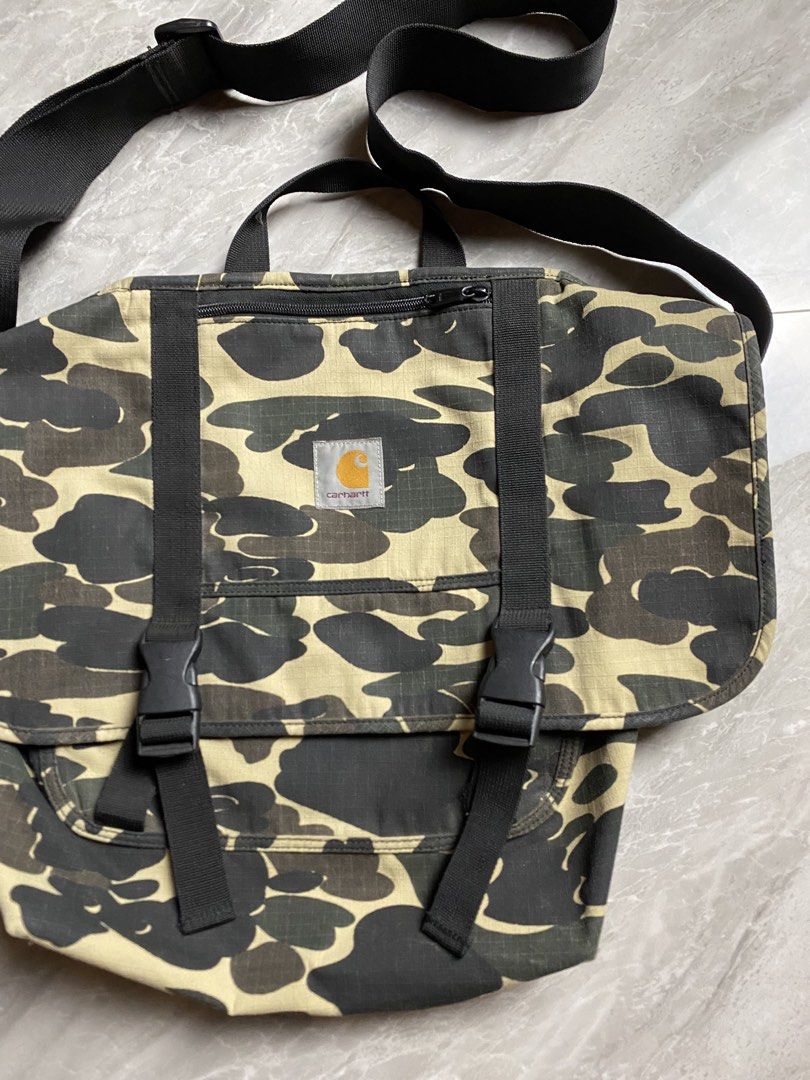 Carhartt Parcel Tote Bag (Category: Sling Bags) located in Cebu City. Submitted by maicoh230 (Listing ID 1470707709, Image 2). Description: Excellent Condition Color Rate: 9/10 Used but not Abused Nice Campu Pattern Heavy Duty Material.