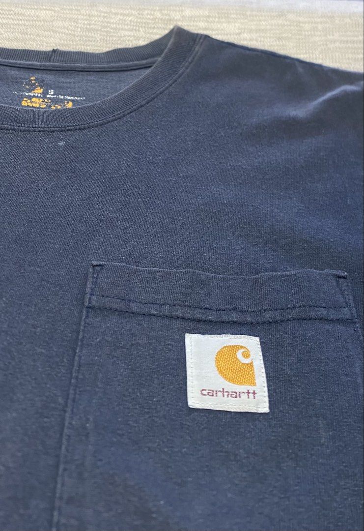 Carhartt Pocket tee (Category: Tshirts & Polo Shirts ) located in Lantapan. Submitted by thriftsylz (Listing ID 1470640613, Image 3). Description: •RFS: Decluttering and Need money for new stocks •ISSUE: Slightly Faded Neckline •Colo Rate: 7/10 •Size: Small on tag (21x27).