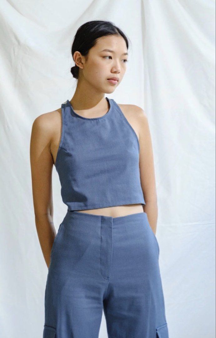 Cariño Romina Top in Denim (Category: Others Tops) located in Mandaluyong City. Submitted by geninishx (Listing ID 1470687950, Image 1). Description: - brand new never used - Size S - RFS: I accidentally buy two - Got it for 1k plus.