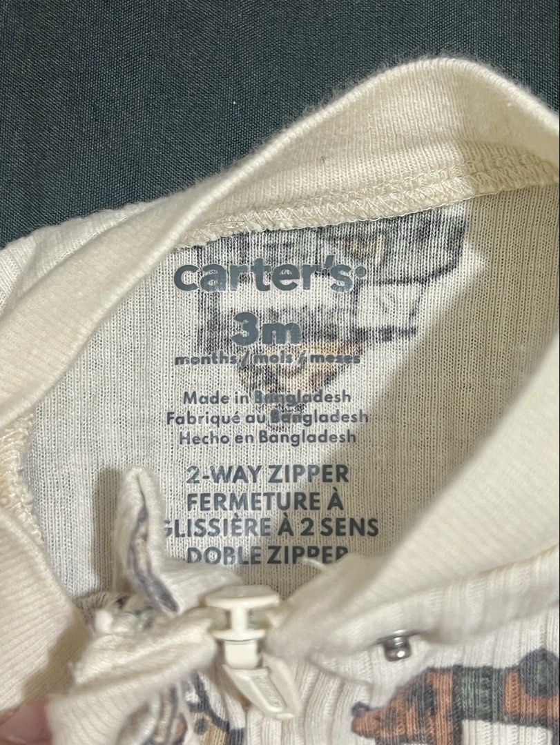 Carter's Baby Zip Romper - 0-3 Months (Category: Babies & Kids Fashion) located in Manila. Submitted by myrs23 (Listing ID 1470687410, Image 2). Description: - Brand: Carter's - Size: 3 Months (0-3 months) - Design: Cream background with cute multi-color food truck print - Feature: Handy 2-way zipper for quick and easy diaper changes - Material: 100% cotton neck and cuffs; body is 60% cotton and 40% polyester - Condition: Soft, comfy, and perfect