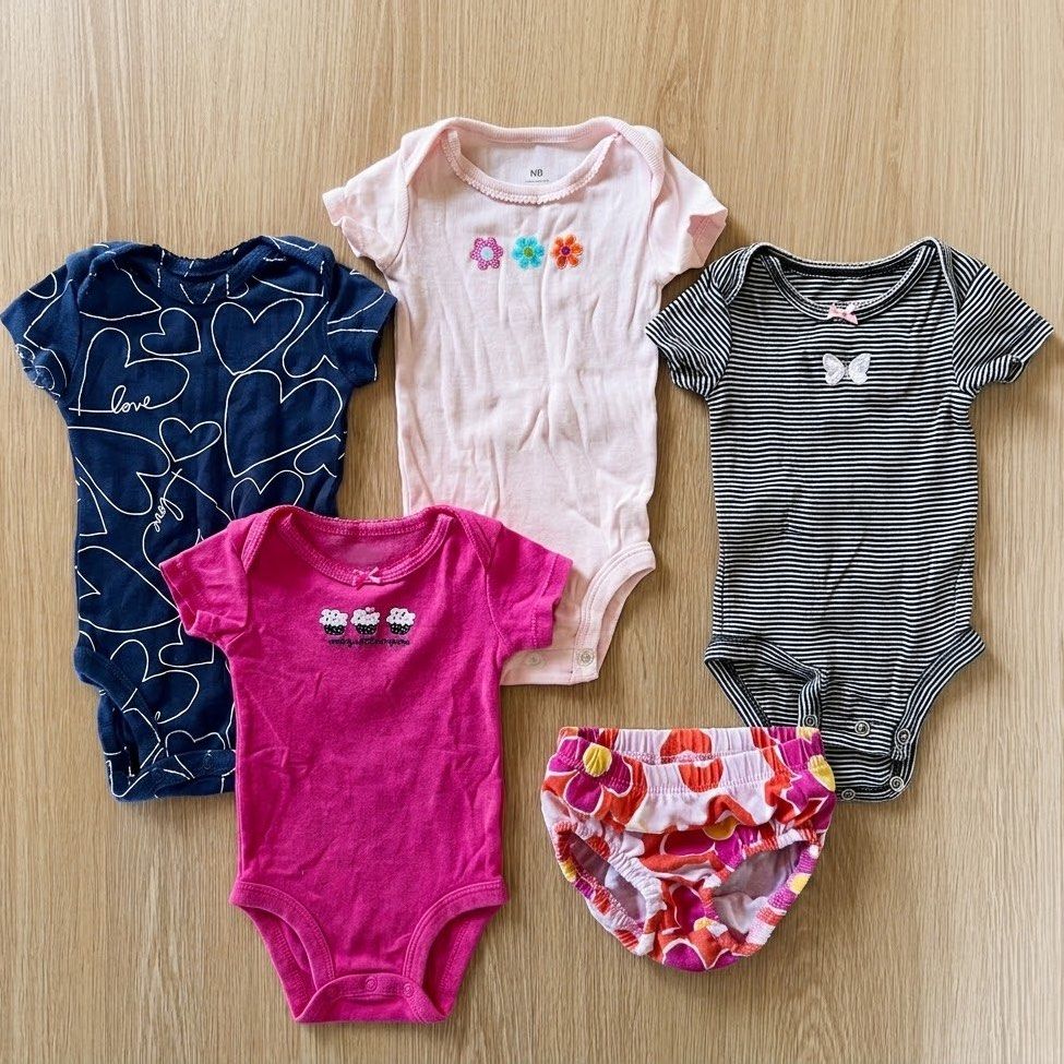TAKE ALL! Carter's Newborn Baby Bodysuits and Bloomers Bundle (Category: Babies & Kids Fashion) located in Quezon City. Submitted by sisyphus.happy (Listing ID 1470593182, Image 1). Description: - Brand: Carter's - Size: Newborn - Includes: 1 black & white striped bodysuit with butterfly graphic, 1 bright pink "Mommy's Little Cupcake" embroidered bodysuit, and 1 pair of colorful floral bloomers with an elastic waistband - Material: Super soft 100