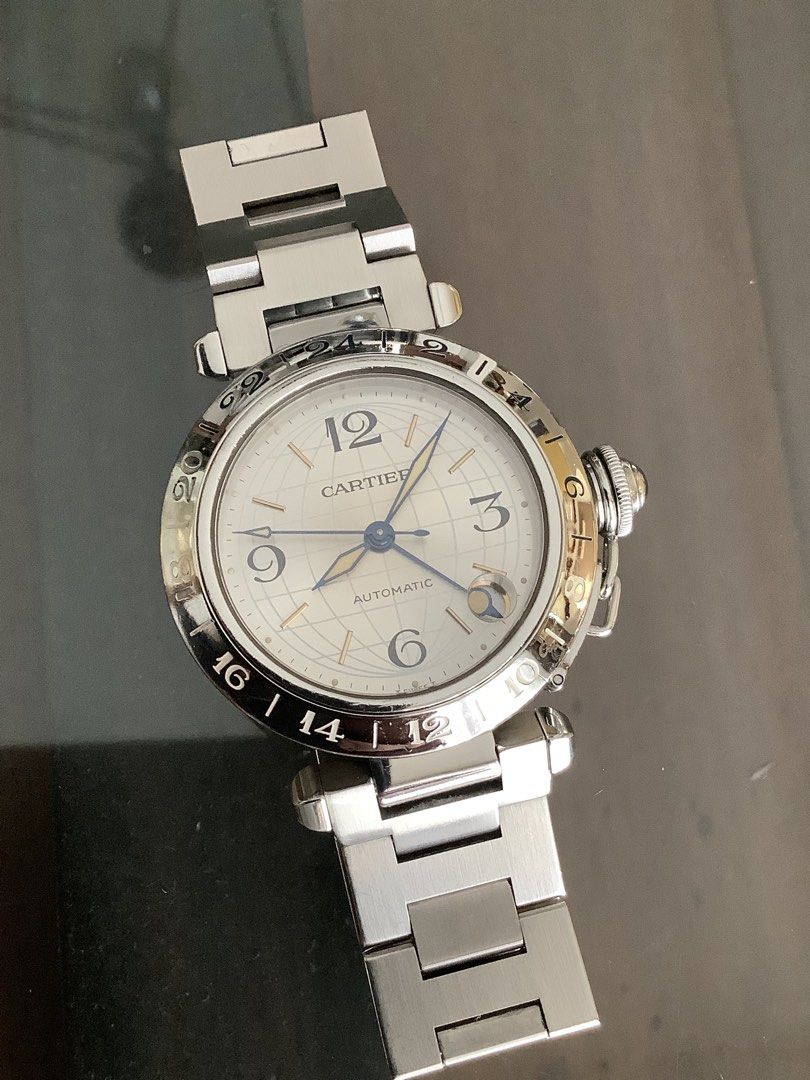 CARTIER C PASHA GMT 35MM (Category: Luxury Watches) located in Taytay. Submitted by eugeneyoung (Listing ID 1470573454, Image 1). Description: ✅ Cartier Pasha C Meridian GMT watch. ✅ Ref.model# 2377. ✅ 35mm. Case size. ✅ Automatic Cartier Swiss movement. ✅ Silver globe Dial. ✅ GMT, Second Time Zone,Date. ✅ 9.2/10 Condition. ✅ Unit with Original Cartier Box, extra link and care manual. ✅ For sale/ Swapping..