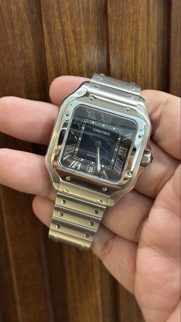 Cartier Santos Large Blue Dial (Category: Luxury Watches) located in Mandaluyong City. Submitted by thesolelicitormnl (Listing ID 1470563181, Image 2). Description: Selling! Cartier Santos Large Blue Dial Ref. WSSA0030 Case size 47.5 mm x 39.8 mm Complete full set with tool and leather strap Extra Rubber Strap Year 2021 Dm if interested 📲.