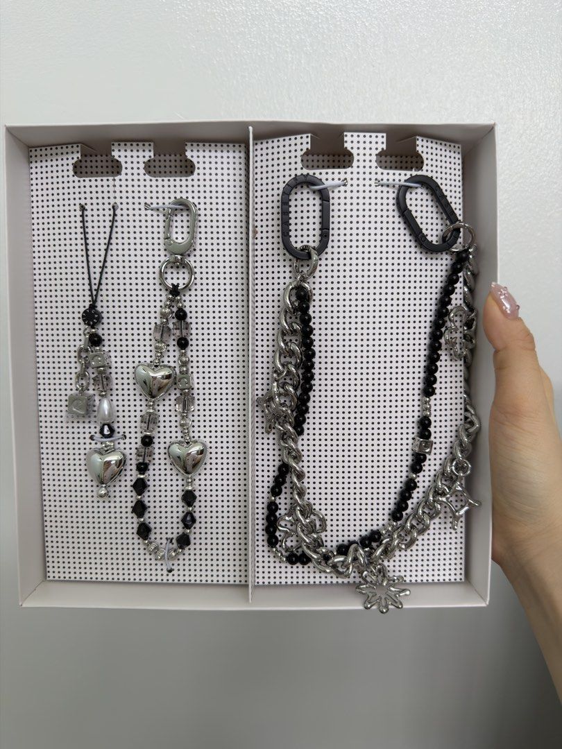 Casetify Black and Silver Phone Charm & Strap Set (Category: Cases & Sleeves) located in Makati City. Submitted by heyuuuu (Listing ID 1470563391, Image 2). Description: Selling this brand new Casetify 3-in-1 phone charm in Obsidian Spark - Price: PHP 3,000 - Location: Marikina - MOP: Gcash/Unionbank/Maribank - MOD: Lalamove/Grab/J&T.