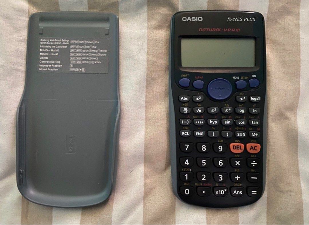 Casio fx-82ES PLUS Scientific Calculator (Category: Office & Business Technology) located in Taguig. Submitted by miss_beloved.25 (Listing ID 1470576819, Image 1). Description: - Model: Casio fx-82ES PLUS scientific calculator (Black & Grey) - Display: Dual-line natural textbook display with a crisp screen - Features: Fraction calculations, statistics, trigonometry, and all standard functions - Protection: Sliding hard cover with a quick referenc